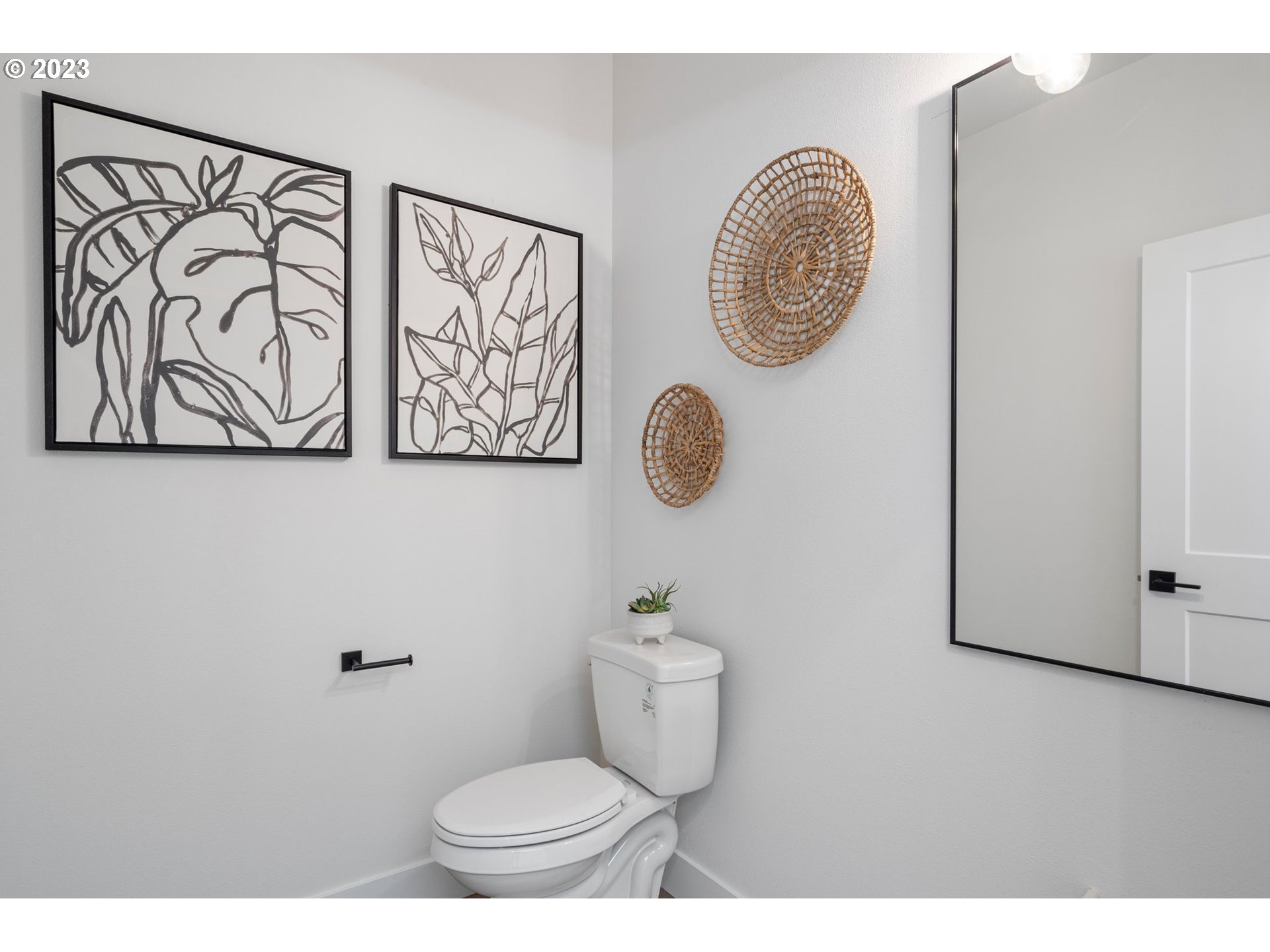 711 Northwest 175th Way Ridgefield, WA 98642 - Photo 9 of 21 a bathroom with a toilet and a sink