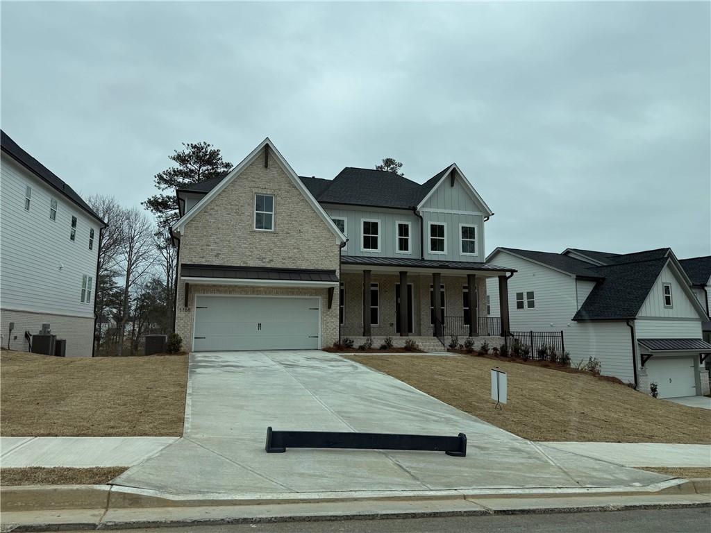 1168 Ridgeview Road Woodstock, GA 30188 - Photo 11 of 17 a front view of a house with garage