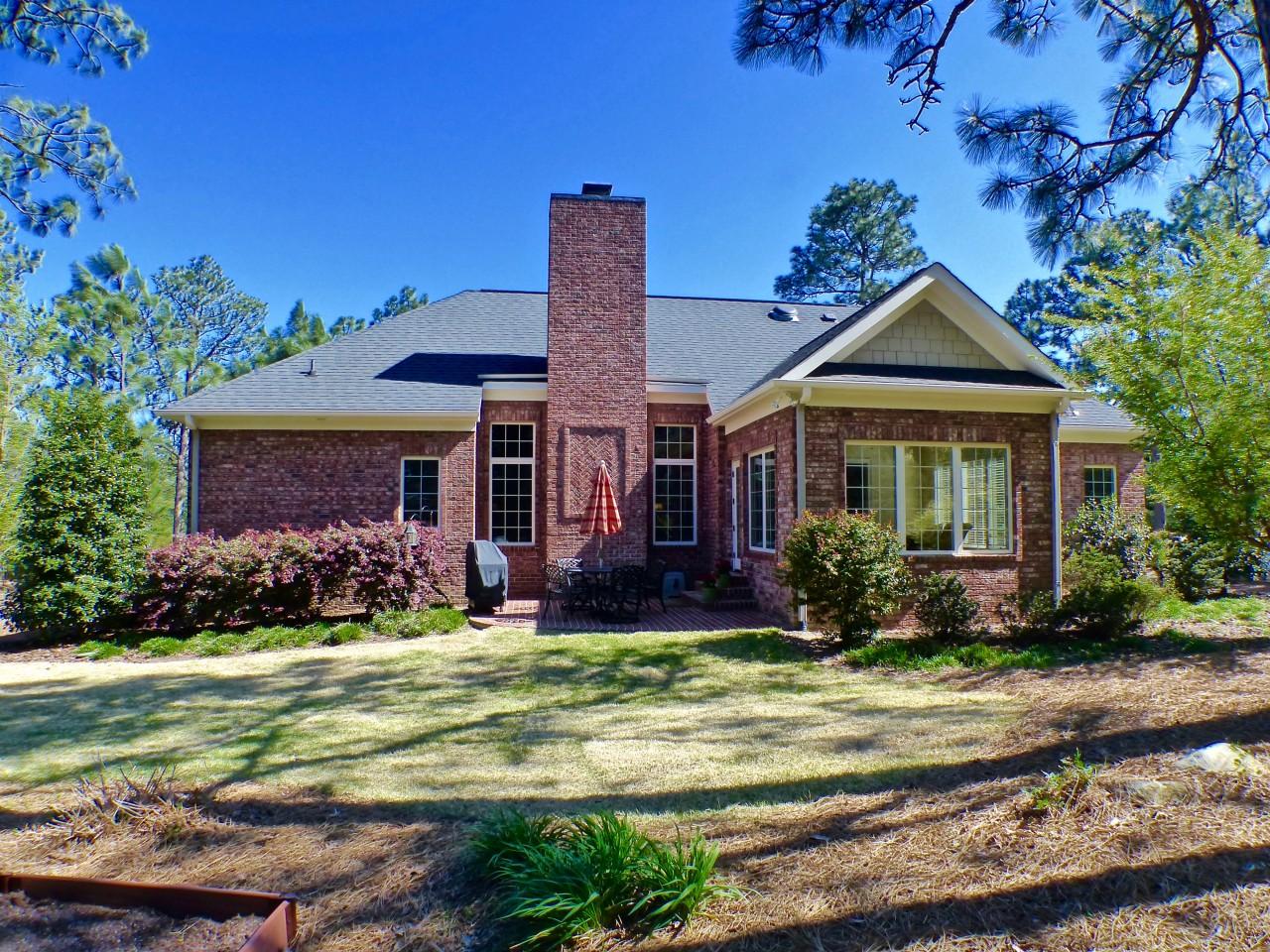 3 Oak Meadow Road Pinehurst, NC 28374 - Photo 23 of 27 Back yard and back patio view