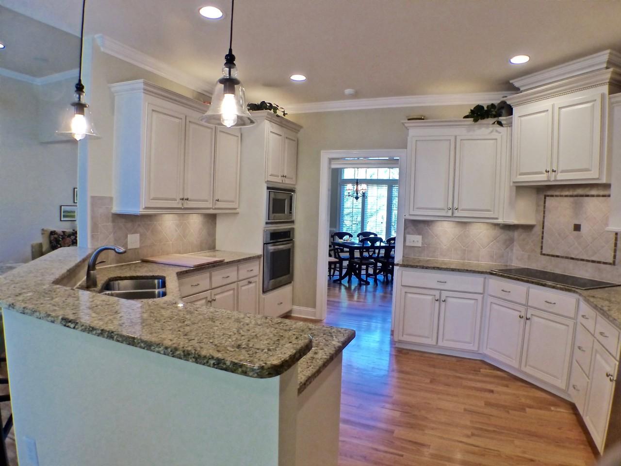 3 Oak Meadow Road Pinehurst, NC 28374 - Photo 8 of 27 Kitchen bar area great to enjoy guests as you cook