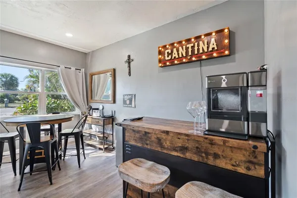 a kitchen with a table and chairs in it