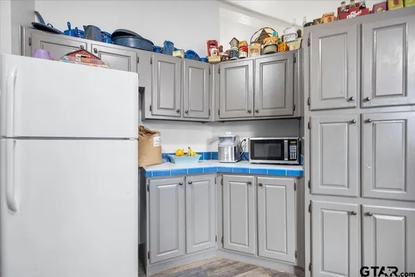 a view of a dining room with furniture and window