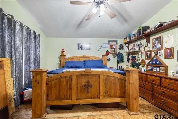 a bathroom with a double vanity sink toilet and shower