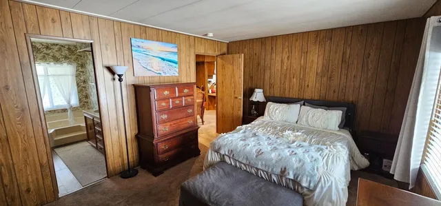 a bathroom with a sink a washer and dryer