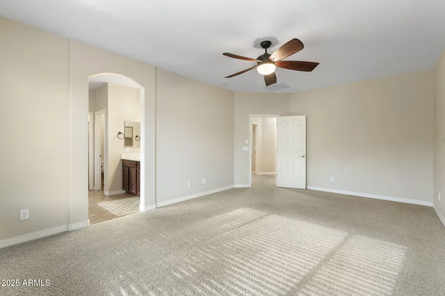 an empty room with entrance and door