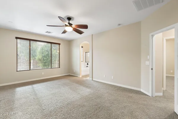 an empty room with entrance and door