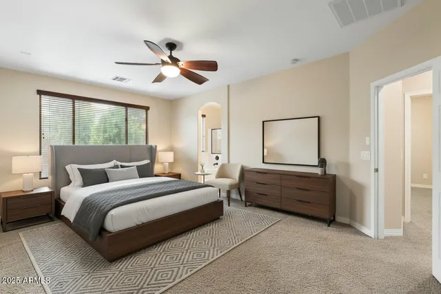 a view of a white house with a large windows