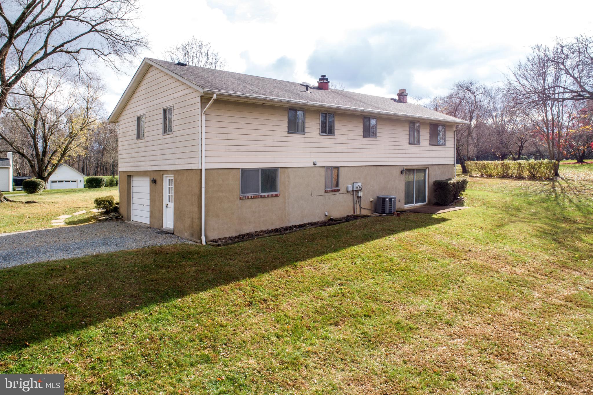 23281 Dover Road Middleburg, VA 20117 - Photo 39 of 65 View of the back of the house w/side door & garage