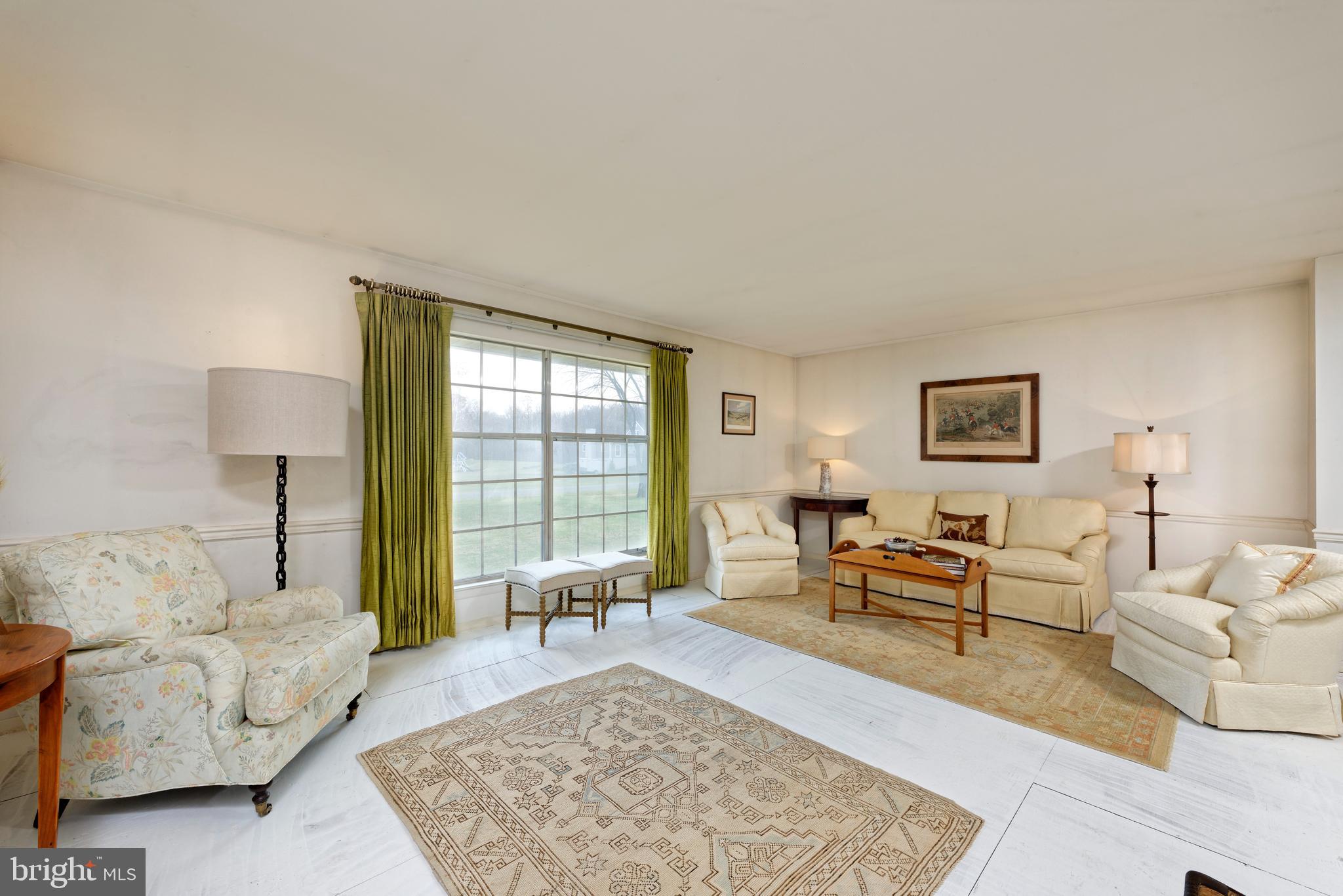 Main level has Living Room w/large picture window