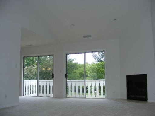 274 Appletree Court, Unit 274 Buffalo Grove, IL 60089 - Photo 3 of 15 a view of porch with a floor to ceiling window