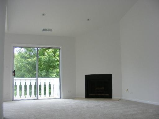 274 Appletree Court, Unit 274 Buffalo Grove, IL 60089 - Photo 4 of 15 a view of an empty room with a window