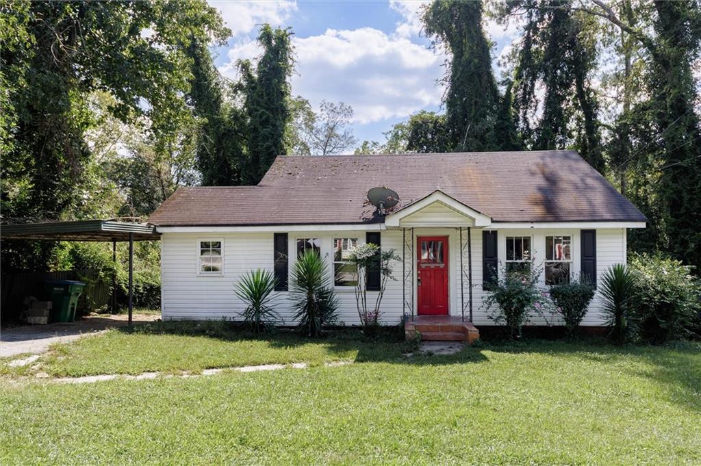 front view of a house with a yard