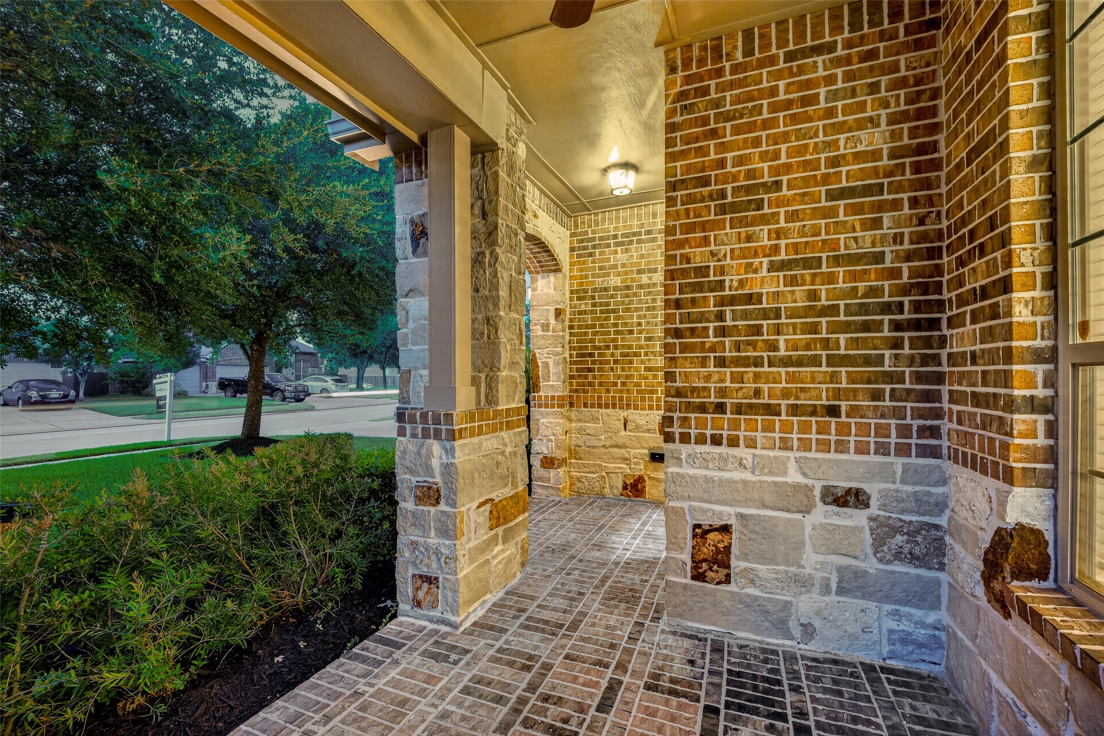7930 Summer Night Lane Rosenberg, TX 77469 - Photo 43 of 48 Inviting covered porch with brick and stone accents and a welcoming entryway.