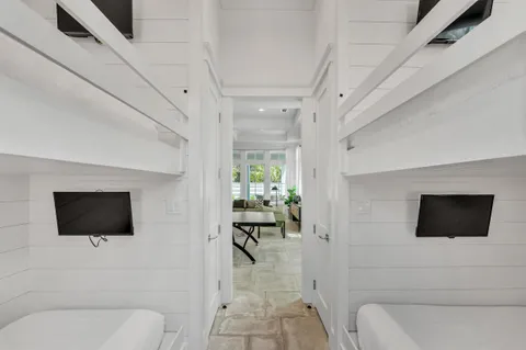 a kitchen with a sink and a large window