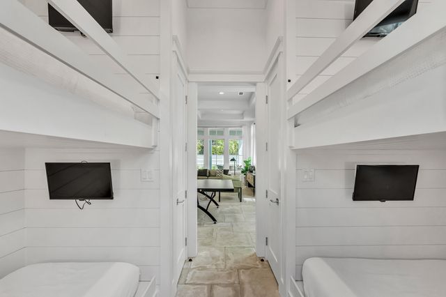 a kitchen with a sink and a large window