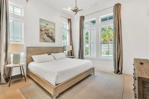 a kitchen with stainless steel appliances a refrigerator and cabinets