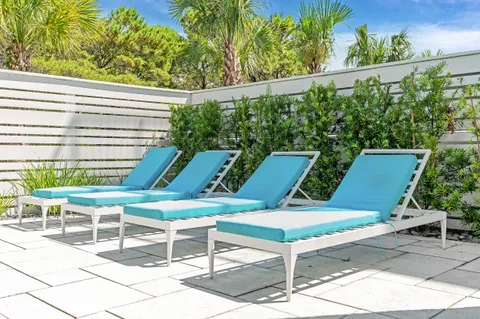 a bathroom with a toilet a sink and a mirror