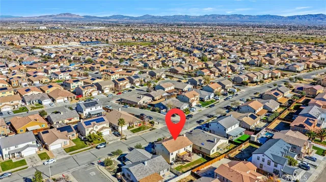 an aerial view of residential building and ocean