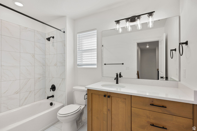 1661 West Ross Road Syracuse, UT 84075 - Photo 24 of 28 Full bathroom featuring shower / tub combination and vanity
