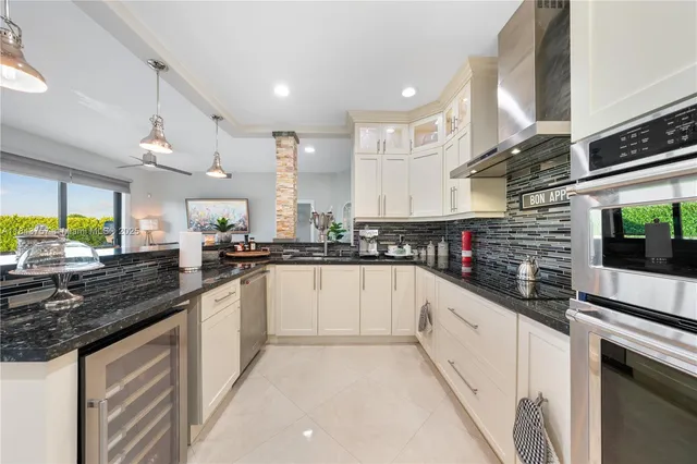 $1,699,999 | 9621 West Calusa Club Drive, Miami, FL 33186