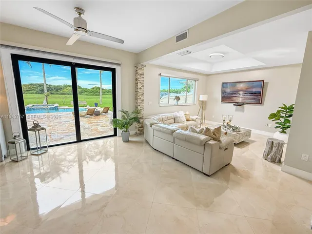 $1,699,999 | 9621 West Calusa Club Drive, Miami, FL 33186