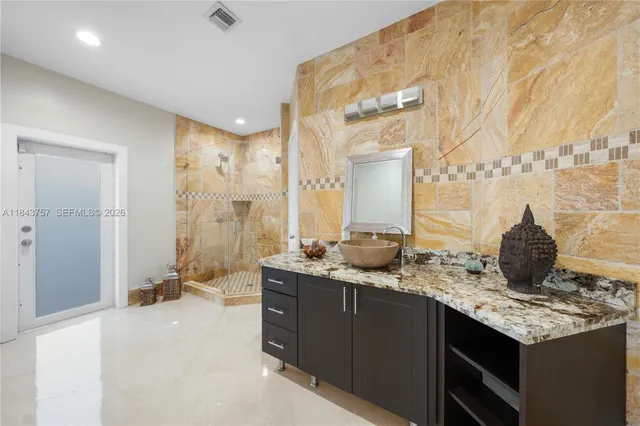 $1,699,999 | 9621 West Calusa Club Drive, Miami, FL 33186