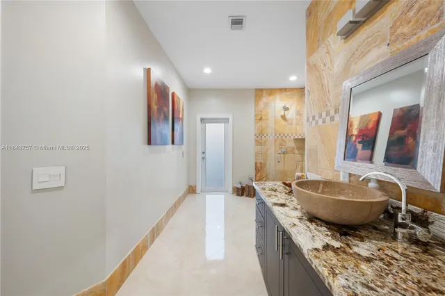 $1,699,999 | 9621 West Calusa Club Drive, Miami, FL 33186