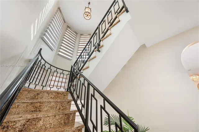 $1,699,999 | 9621 West Calusa Club Drive, Miami, FL 33186