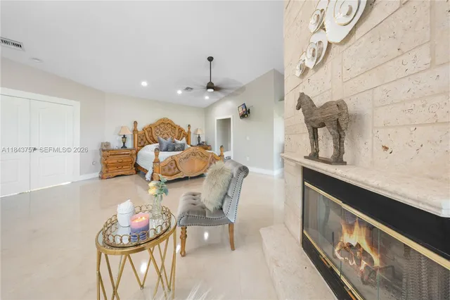 $1,699,999 | 9621 West Calusa Club Drive, Miami, FL 33186