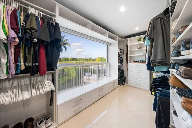 $1,699,999 | 9621 West Calusa Club Drive, Miami, FL 33186