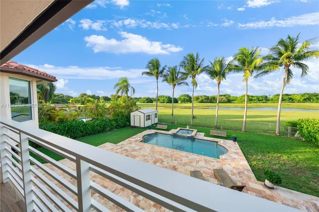 $1,699,999 | 9621 West Calusa Club Drive, Miami, FL 33186