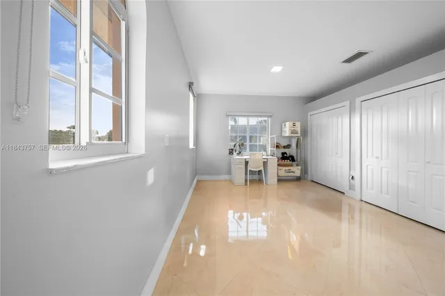 $1,699,999 | 9621 West Calusa Club Drive, Miami, FL 33186