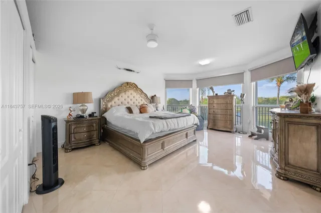 $1,699,999 | 9621 West Calusa Club Drive, Miami, FL 33186