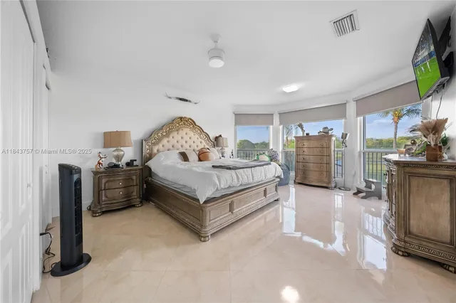 $1,699,999 | 9621 West Calusa Club Drive, Miami, FL 33186