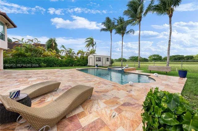 $1,699,999 | 9621 West Calusa Club Drive, Miami, FL 33186