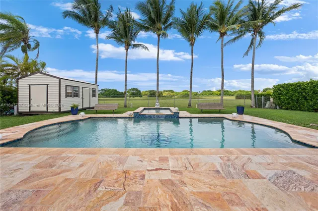 $1,699,999 | 9621 West Calusa Club Drive, Miami, FL 33186