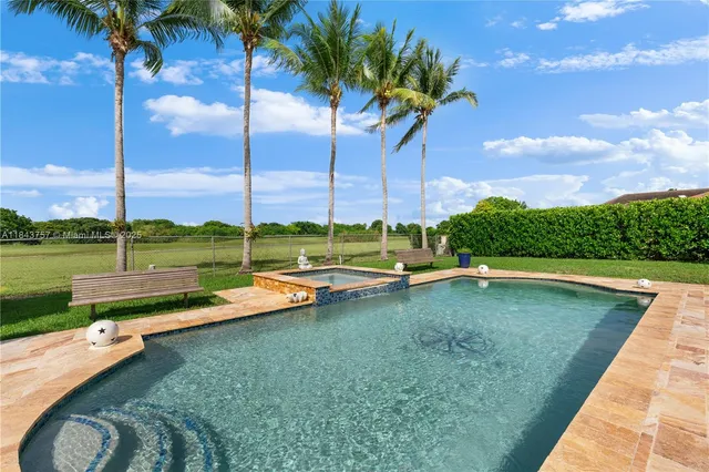 $1,699,999 | 9621 West Calusa Club Drive, Miami, FL 33186