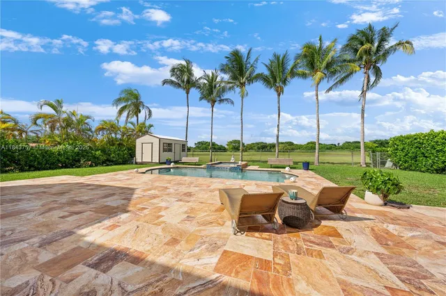 $1,699,999 | 9621 West Calusa Club Drive, Miami, FL 33186