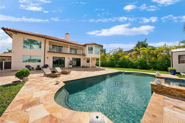 $1,699,999 | 9621 West Calusa Club Drive, Miami, FL 33186