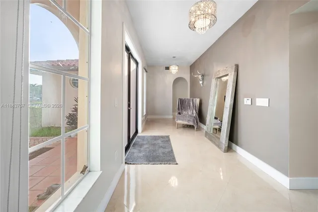 $1,699,999 | 9621 West Calusa Club Drive, Miami, FL 33186