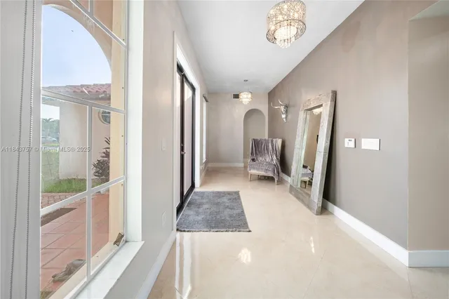 $1,699,999 | 9621 West Calusa Club Drive, Miami, FL 33186