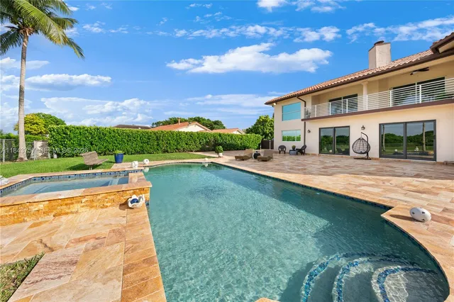 $1,699,999 | 9621 West Calusa Club Drive, Miami, FL 33186