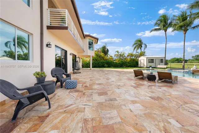 $1,699,999 | 9621 West Calusa Club Drive, Miami, FL 33186