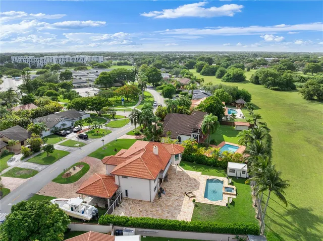 $1,699,999 | 9621 West Calusa Club Drive, Miami, FL 33186