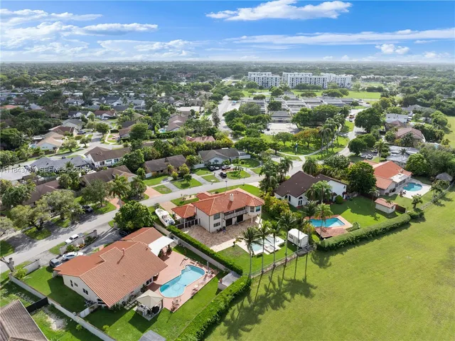 $1,699,999 | 9621 West Calusa Club Drive, Miami, FL 33186