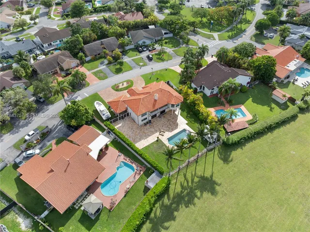 $1,699,999 | 9621 West Calusa Club Drive, Miami, FL 33186
