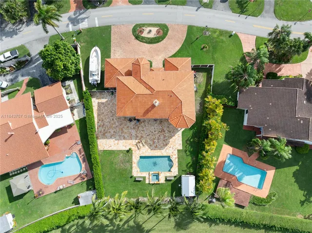 $1,699,999 | 9621 West Calusa Club Drive, Miami, FL 33186