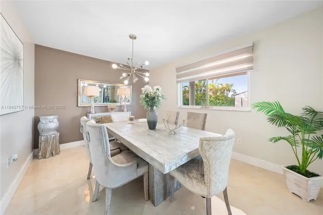 $1,699,999 | 9621 West Calusa Club Drive, Miami, FL 33186