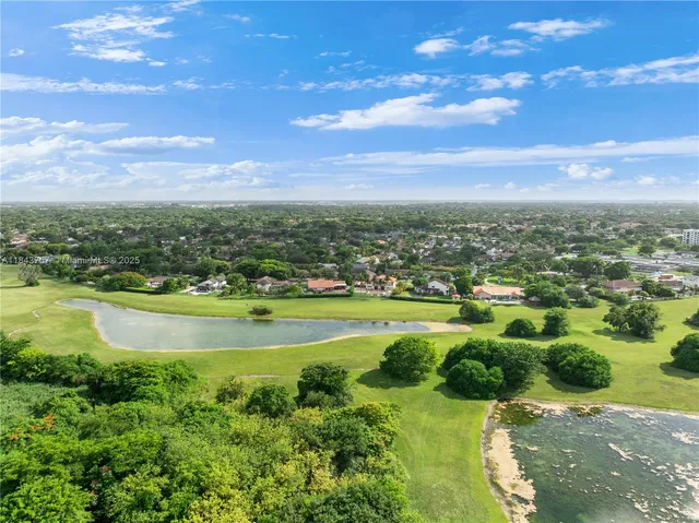 $1,699,999 | 9621 West Calusa Club Drive, Miami, FL 33186