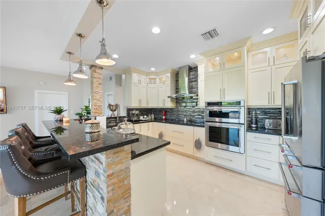 $1,699,999 | 9621 West Calusa Club Drive, Miami, FL 33186